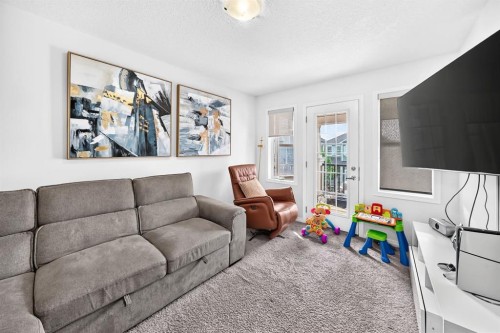 446 Windrow Common Sw, Airdrie, AB - Indoor Photo Showing Living Room