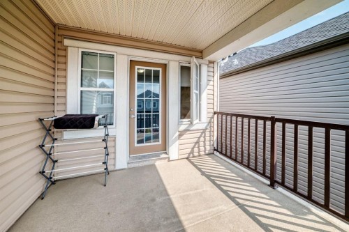 446 Windrow Common Sw, Airdrie, AB - Outdoor With Deck Patio Veranda With Exterior