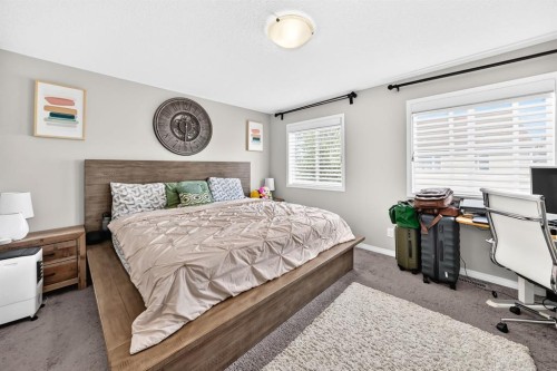 446 Windrow Common Sw, Airdrie, AB - Indoor Photo Showing Bedroom