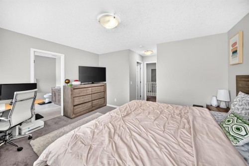 446 Windrow Common Sw, Airdrie, AB - Indoor Photo Showing Bedroom