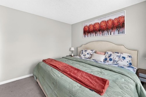 446 Windrow Common Sw, Airdrie, AB - Indoor Photo Showing Bedroom
