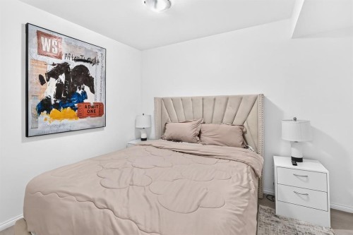446 Windrow Common Sw, Airdrie, AB - Indoor Photo Showing Bedroom