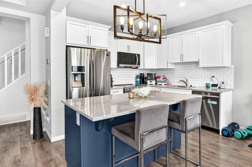 446 Windrow Common Sw, Airdrie, AB - Indoor Photo Showing Kitchen With Stainless Steel Kitchen With Upgraded Kitchen