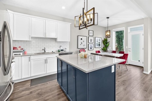446 Windrow Common Sw, Airdrie, AB - Indoor Photo Showing Kitchen With Upgraded Kitchen
