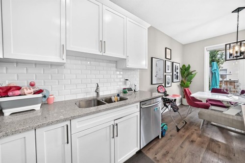 446 Windrow Common Sw, Airdrie, AB - Indoor Photo Showing Kitchen With Double Sink