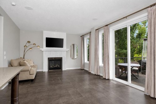 244 Mahogany Bay Se, Calgary, AB - Indoor Photo Showing Living Room With Fireplace