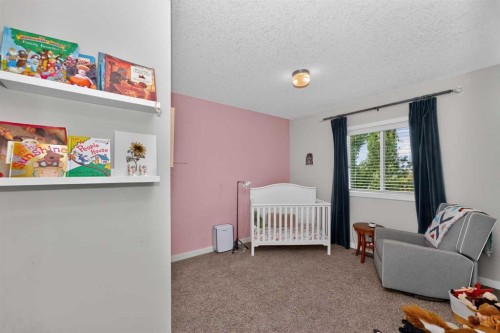 244 Mahogany Bay Se, Calgary, AB - Indoor Photo Showing Bedroom