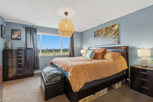 69 Everhollow Avenue Sw, Calgary, AB - Indoor Photo Showing Bedroom