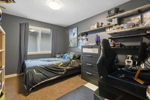 69 Everhollow Avenue Sw, Calgary, AB - Indoor Photo Showing Bedroom