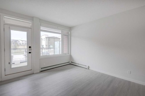 110-214 Sherwood Square Nw, Calgary, AB - Indoor Photo Showing Other Room