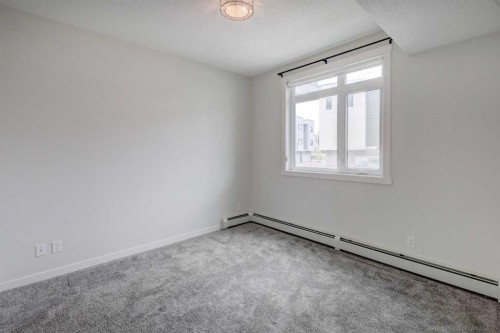 110-214 Sherwood Square Nw, Calgary, AB - Indoor Photo Showing Other Room