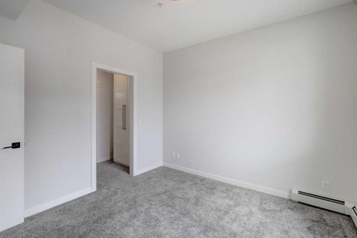 110-214 Sherwood Square Nw, Calgary, AB - Indoor Photo Showing Other Room