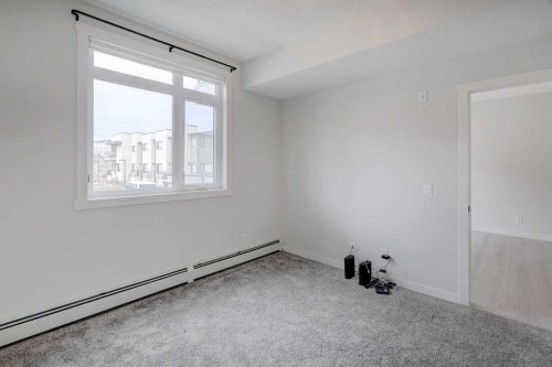 110-214 Sherwood Square Nw, Calgary, AB - Indoor Photo Showing Other Room