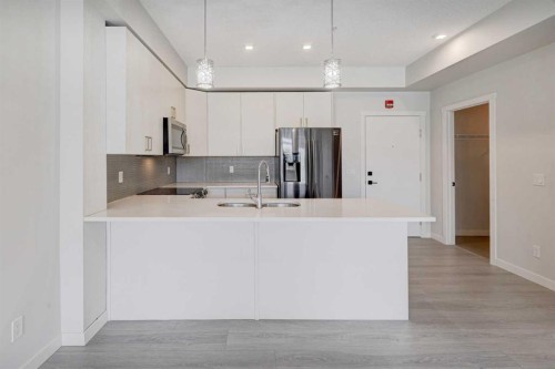 110-214 Sherwood Square Nw, Calgary, AB - Indoor Photo Showing Kitchen