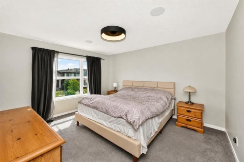 23 Lucas Boulevard Nw, Calgary, AB - Indoor Photo Showing Bedroom