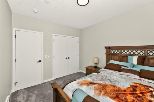 23 Lucas Boulevard Nw, Calgary, AB - Indoor Photo Showing Bedroom