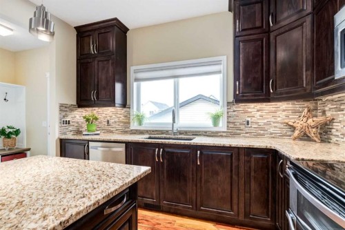 2620 Reunion Square Nw, Airdrie, AB - Indoor Photo Showing Kitchen With Upgraded Kitchen