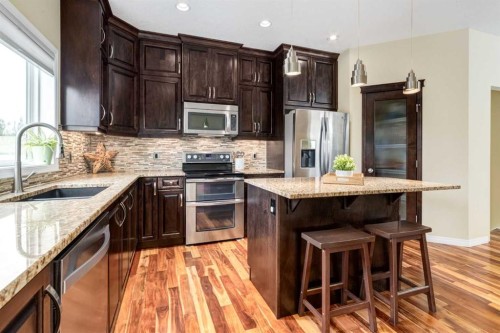2620 Reunion Square Nw, Airdrie, AB - Indoor Photo Showing Kitchen With Stainless Steel Kitchen With Upgraded Kitchen