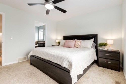 2620 Reunion Square Nw, Airdrie, AB - Indoor Photo Showing Bedroom