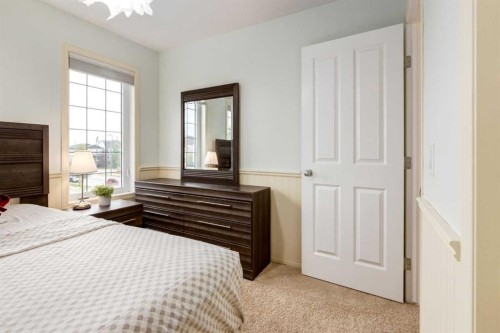 2620 Reunion Square Nw, Airdrie, AB - Indoor Photo Showing Bedroom