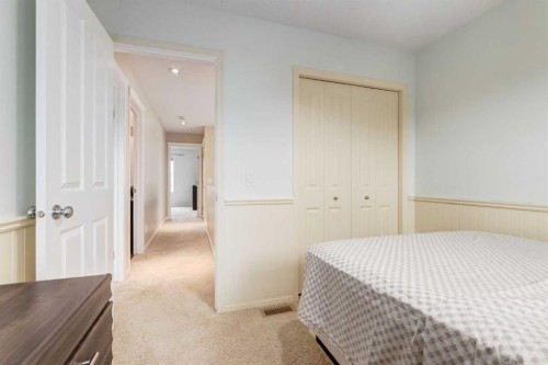 2620 Reunion Square Nw, Airdrie, AB - Indoor Photo Showing Bedroom