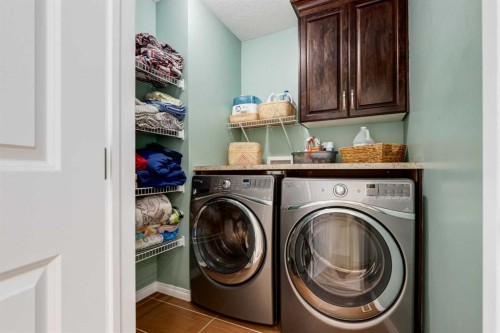 2620 Reunion Square Nw, Airdrie, AB - Indoor Photo Showing Laundry Room