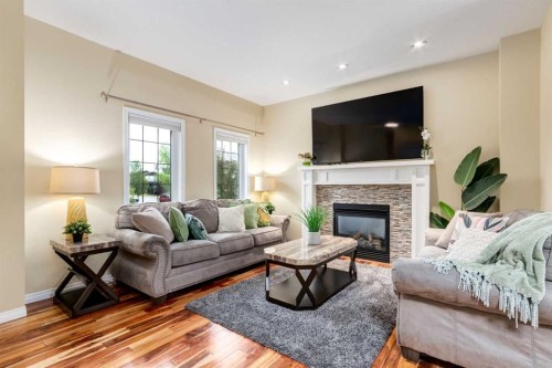 2620 Reunion Square Nw, Airdrie, AB - Indoor Photo Showing Living Room With Fireplace