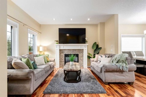 2620 Reunion Square Nw, Airdrie, AB - Indoor Photo Showing Living Room With Fireplace