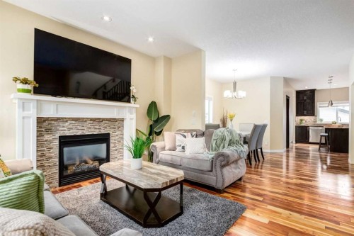 2620 Reunion Square Nw, Airdrie, AB - Indoor Photo Showing Living Room With Fireplace