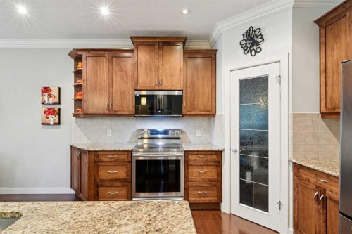 64 Bridle Estates Place Sw, Calgary, AB - Indoor Photo Showing Kitchen