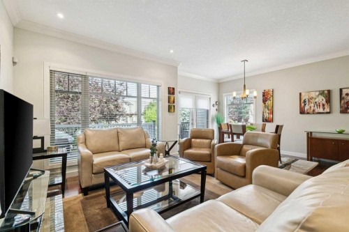 64 Bridle Estates Place Sw, Calgary, AB - Indoor Photo Showing Living Room