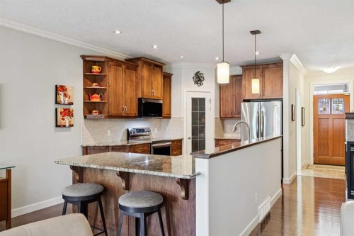 64 Bridle Estates Place Sw, Calgary, AB - Indoor Photo Showing Kitchen With Upgraded Kitchen