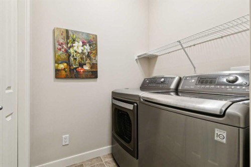64 Bridle Estates Place Sw, Calgary, AB - Indoor Photo Showing Laundry Room