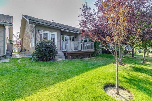 64 Bridle Estates Place Sw, Calgary, AB - Outdoor With Deck Patio Veranda
