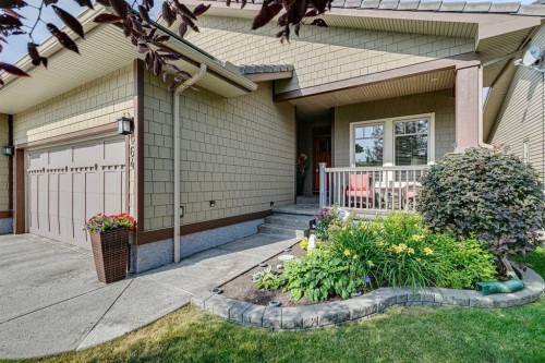 64 Bridle Estates Place Sw, Calgary, AB - Outdoor With Deck Patio Veranda With Exterior