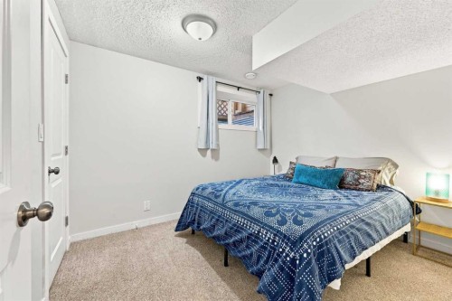 106 Autumn Crescent Se, Calgary, AB - Indoor Photo Showing Bedroom