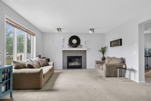112 Valley Stream Close Nw, Calgary, AB - Indoor Photo Showing Living Room With Fireplace