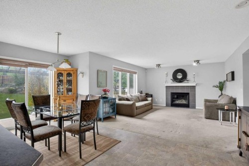 112 Valley Stream Close Nw, Calgary, AB - Indoor With Fireplace