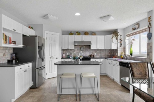 112 Valley Stream Close Nw, Calgary, AB - Indoor Photo Showing Kitchen With Stainless Steel Kitchen With Upgraded Kitchen