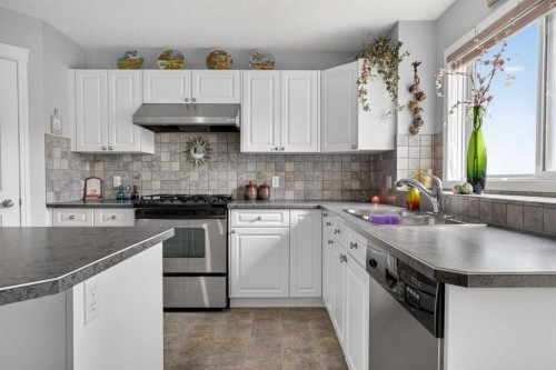 112 Valley Stream Close Nw, Calgary, AB - Indoor Photo Showing Kitchen With Stainless Steel Kitchen With Double Sink With Upgraded Kitchen