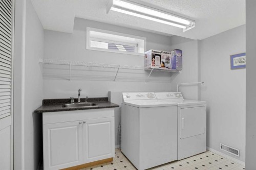 112 Valley Stream Close Nw, Calgary, AB - Indoor Photo Showing Laundry Room