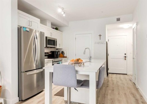 311-30 Sage Hill Nw, Calgary, AB - Indoor Photo Showing Kitchen With Stainless Steel Kitchen With Upgraded Kitchen