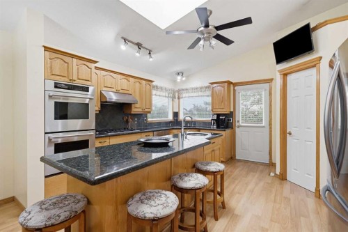 535 Cimarron Point, Okotoks, AB - Indoor Photo Showing Kitchen