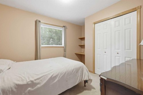 535 Cimarron Point, Okotoks, AB - Indoor Photo Showing Bedroom