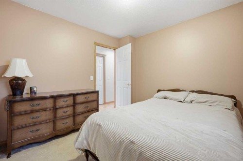 535 Cimarron Point, Okotoks, AB - Indoor Photo Showing Bedroom