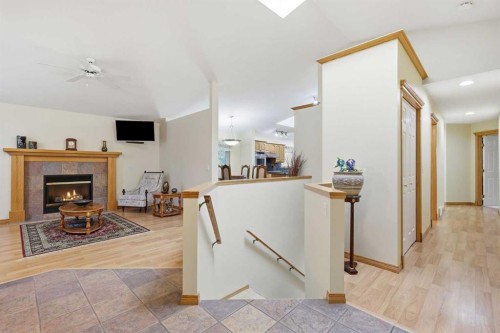 535 Cimarron Point, Okotoks, AB - Indoor With Fireplace