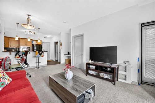 303-70 Royal Oak Plaza Nw, Calgary, AB - Indoor Photo Showing Living Room