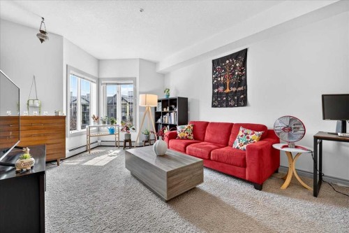 303-70 Royal Oak Plaza Nw, Calgary, AB - Indoor Photo Showing Living Room