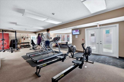 303-70 Royal Oak Plaza Nw, Calgary, AB - Indoor Photo Showing Gym Room