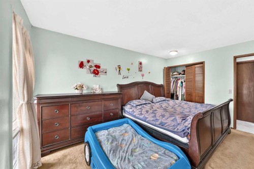 11 Rundlemere Place Ne, Calgary, AB - Indoor Photo Showing Bedroom